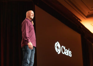 Photo of Brad Frietag announcing the company's name change to from FileMaker to Claris