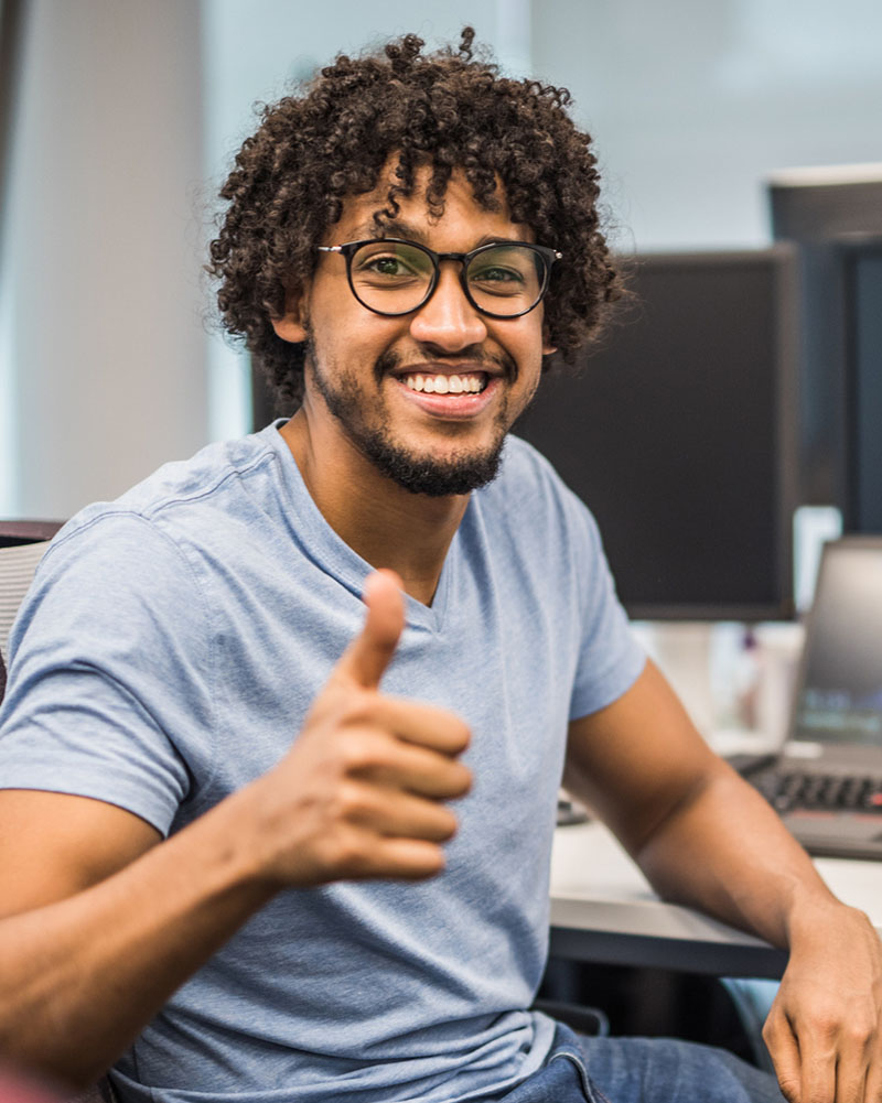 Photo of a tech start-up founder looking at the camera