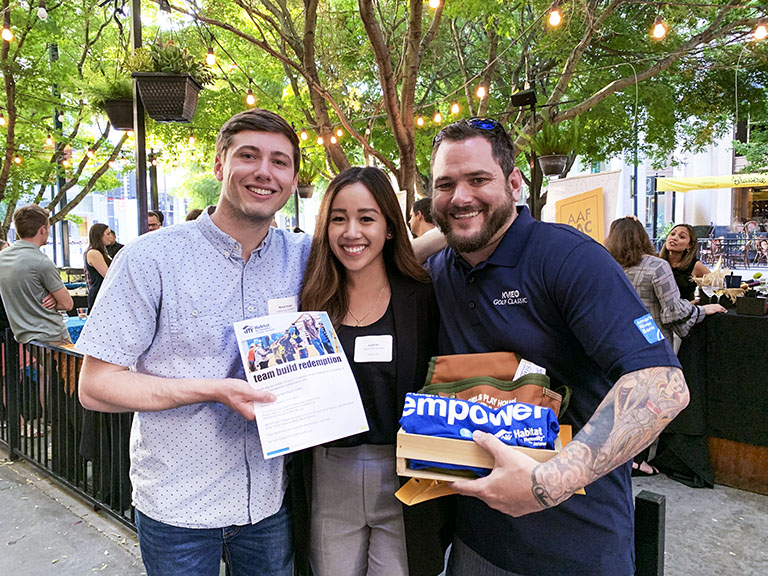 Marik, Lyna, and Robert with Habitat for Humanity prize