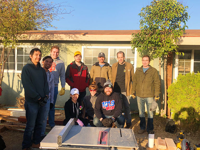 Capitol Tech Solutions team at construction site of Habitat for Humanity